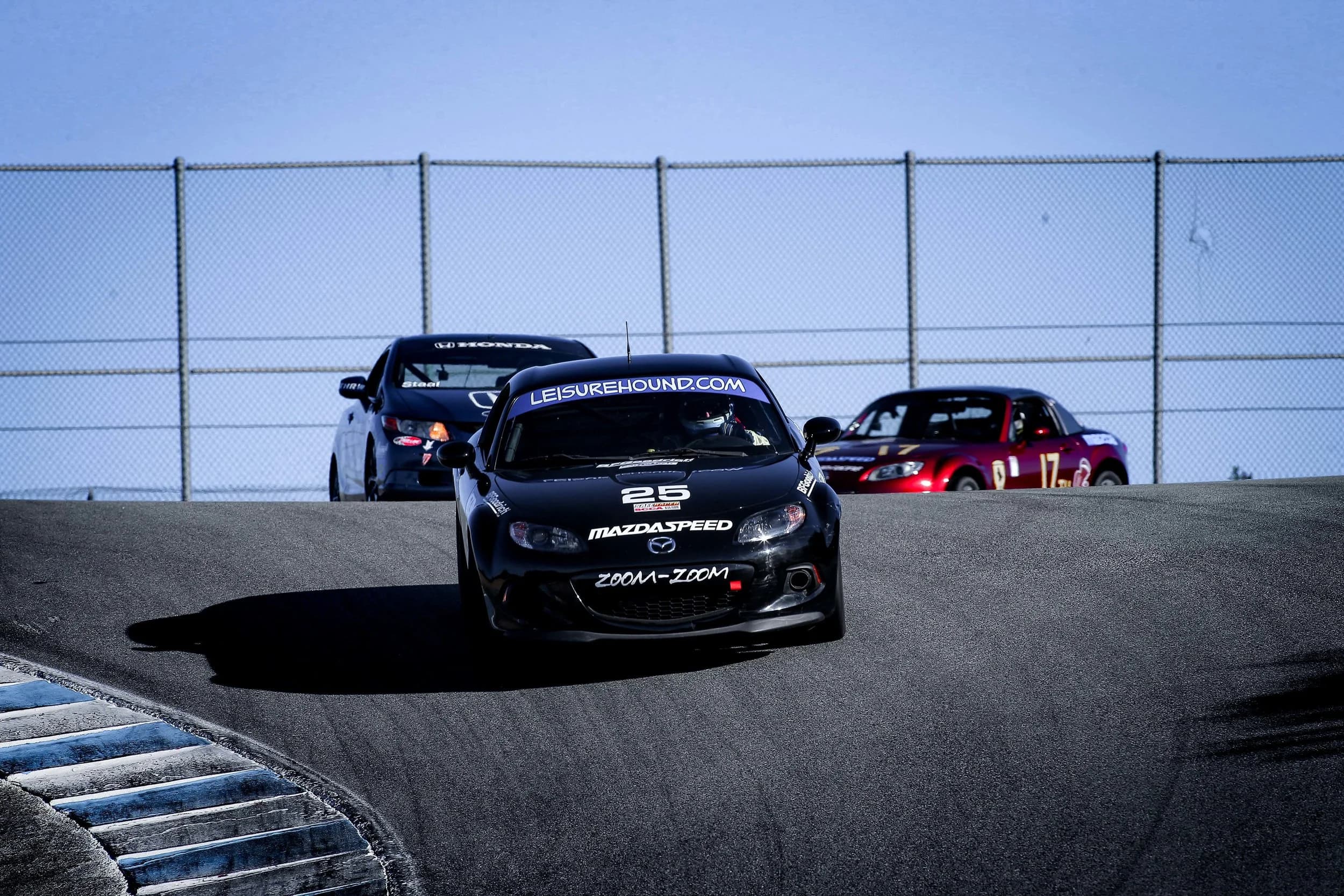 black 25 car on the track
